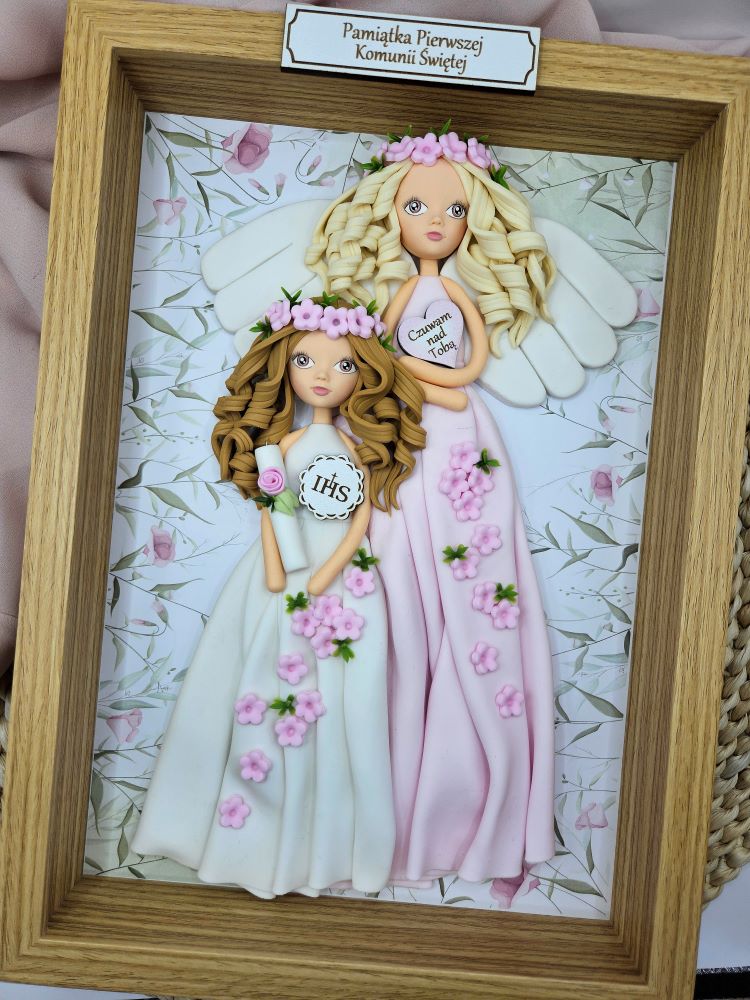 niepowtarzalny-prezent-na-komunię-od-chrzestnej-anioły