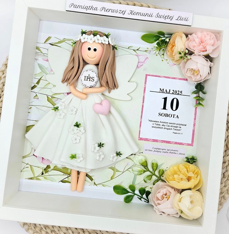 Pamiątka pierwszej komunii świętej dla dziewczynki. Aniołek w ramce.